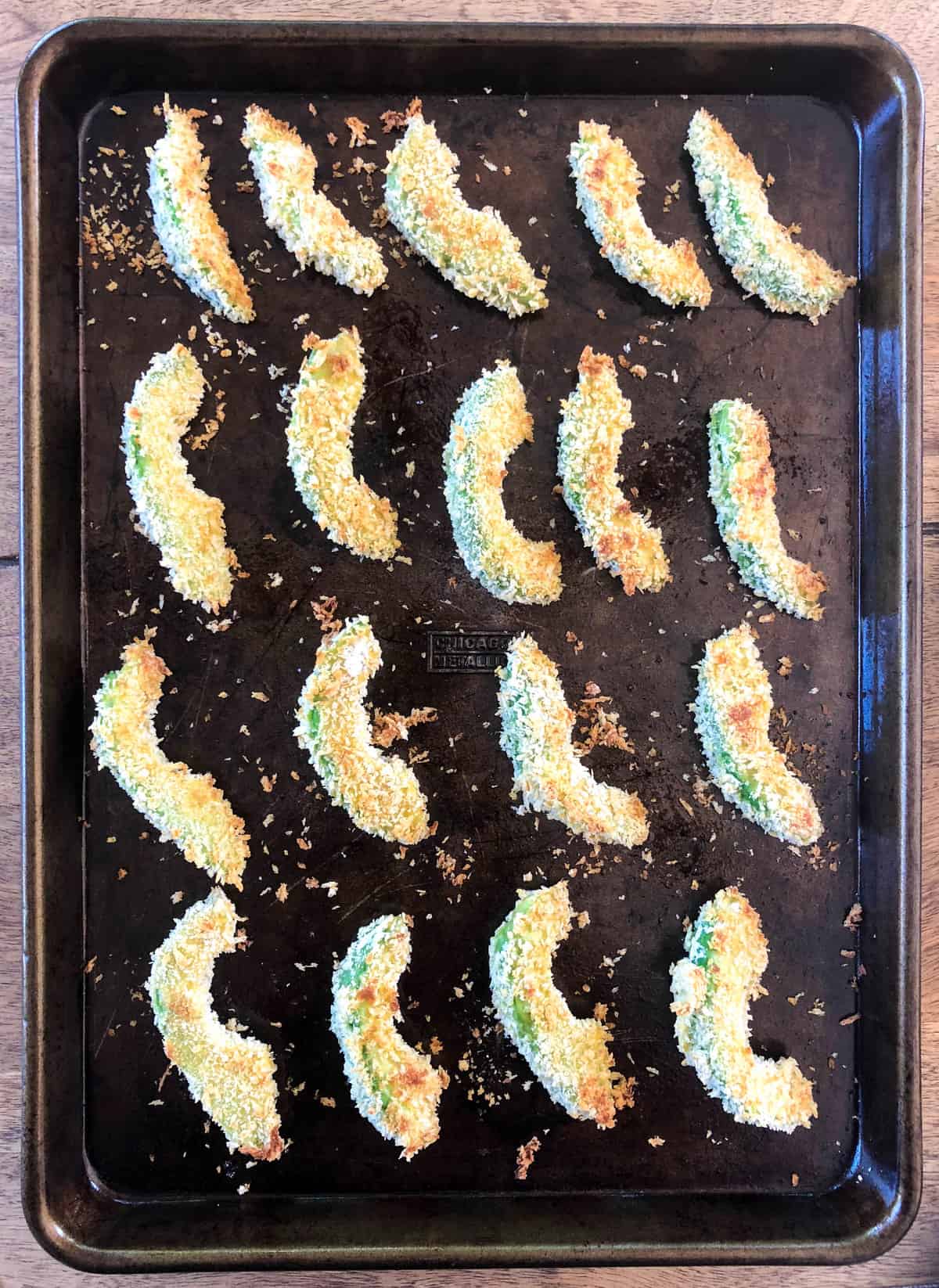 Avocado Fries on greased baking sheet