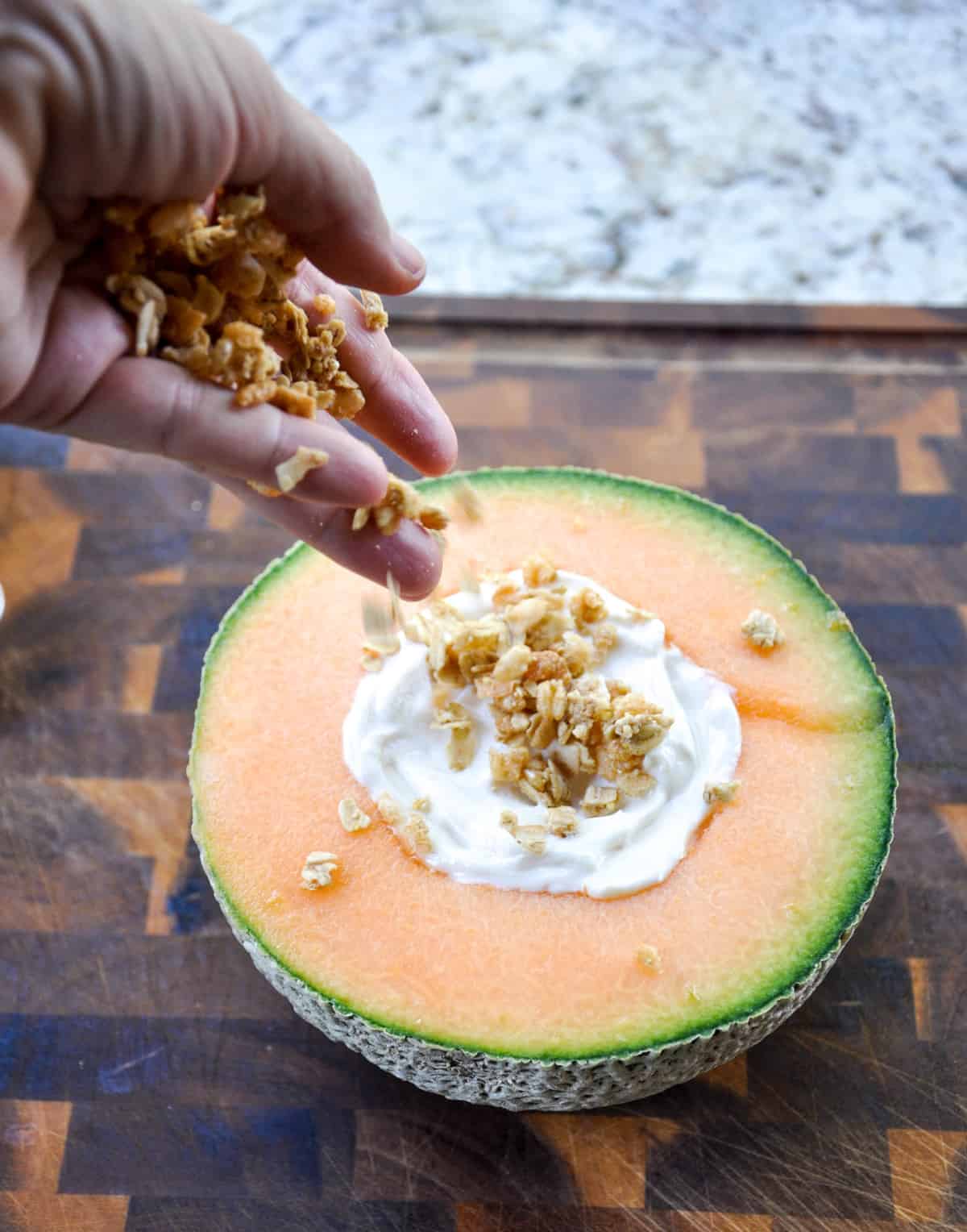 Cantaloupe Breakfast Bowls. Perfect for dessert too! Load the center with greek yogurt and top with fresh berries and granola. YUM!