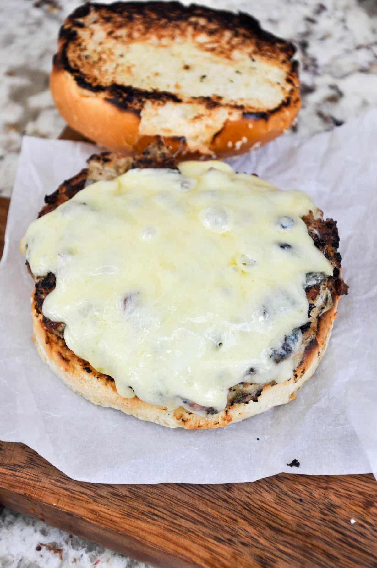 Melted pepper jack cheese over turkey patty