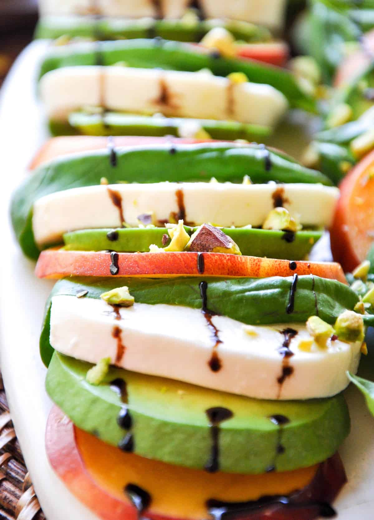 Summerfy your Caprese salad using nectarines and avocado. Delish!